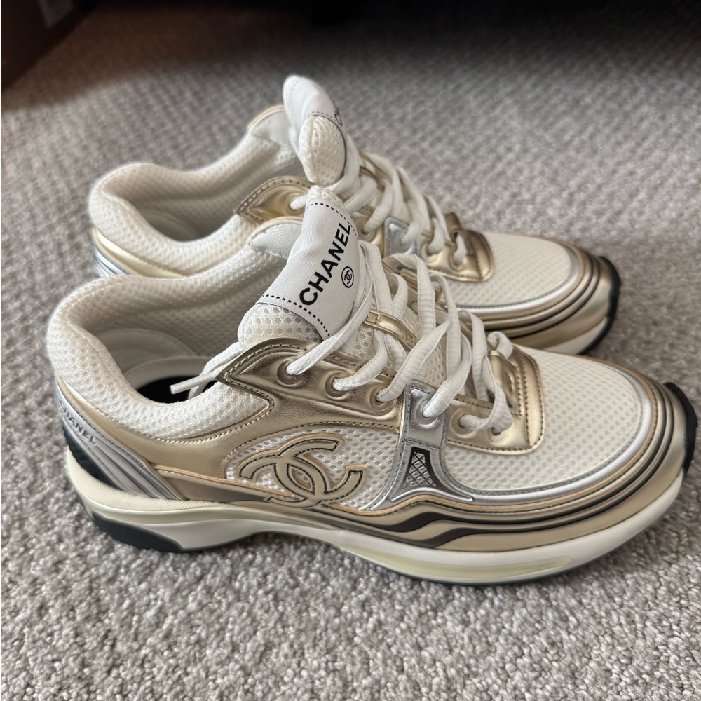 Chanel Women's Gold and White Sneakers